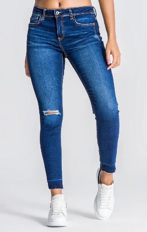 Blue Jeans With Ripped Hem